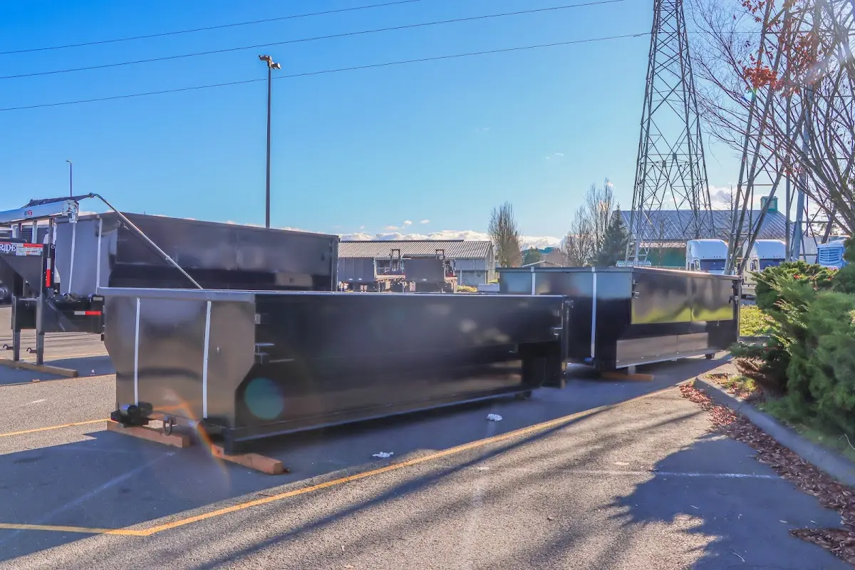 Roll-off dumpster ready for waste disposal at job site for Concrete Dumpster Rental in Somers